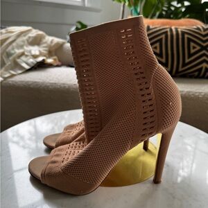 GIANVITO ROSSI
Vires 105 stretch-knit sock boots 41